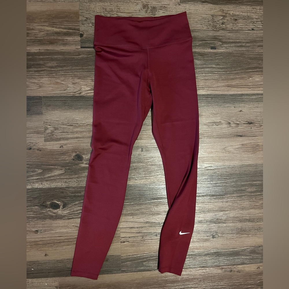 Nike Dri-fit high rise leggings. Burgundy color. Women’s size small